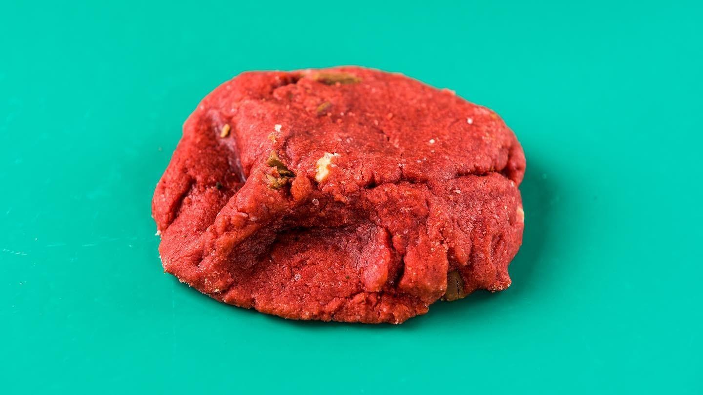A soft Red Velvet cookie with dark and white chocolate chunks